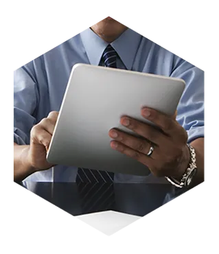 Business person holding and interacting with a tablet