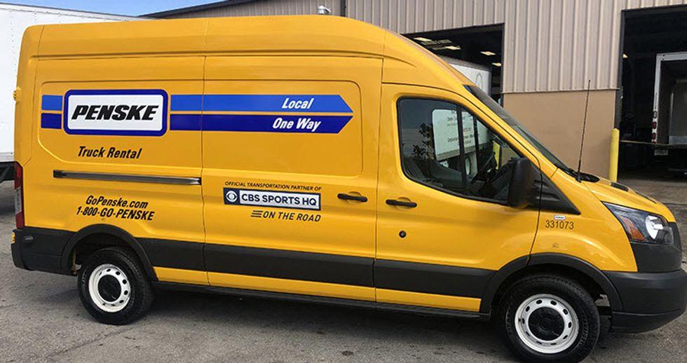 penske cargo van with cbs sports hq decal