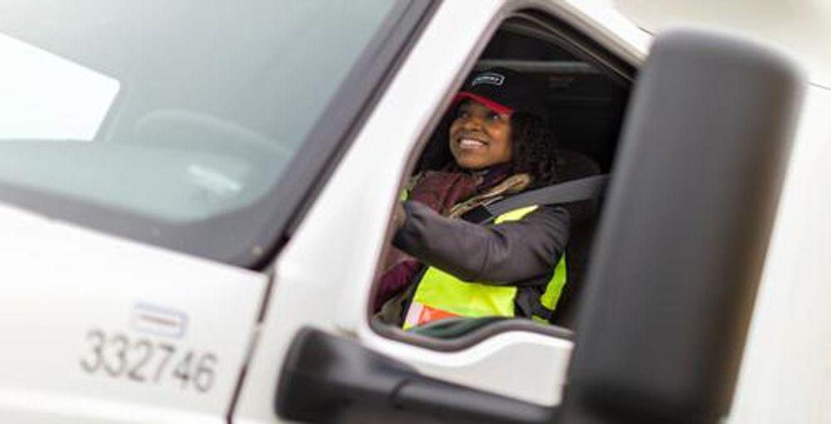 professional truck driver wearing a seat belt